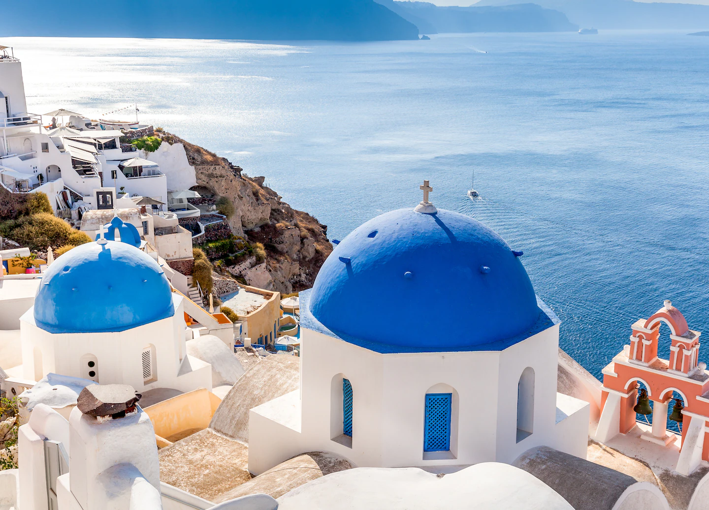 stock-photo-santorini-s-blue-domes-and-ocean-views-399237100